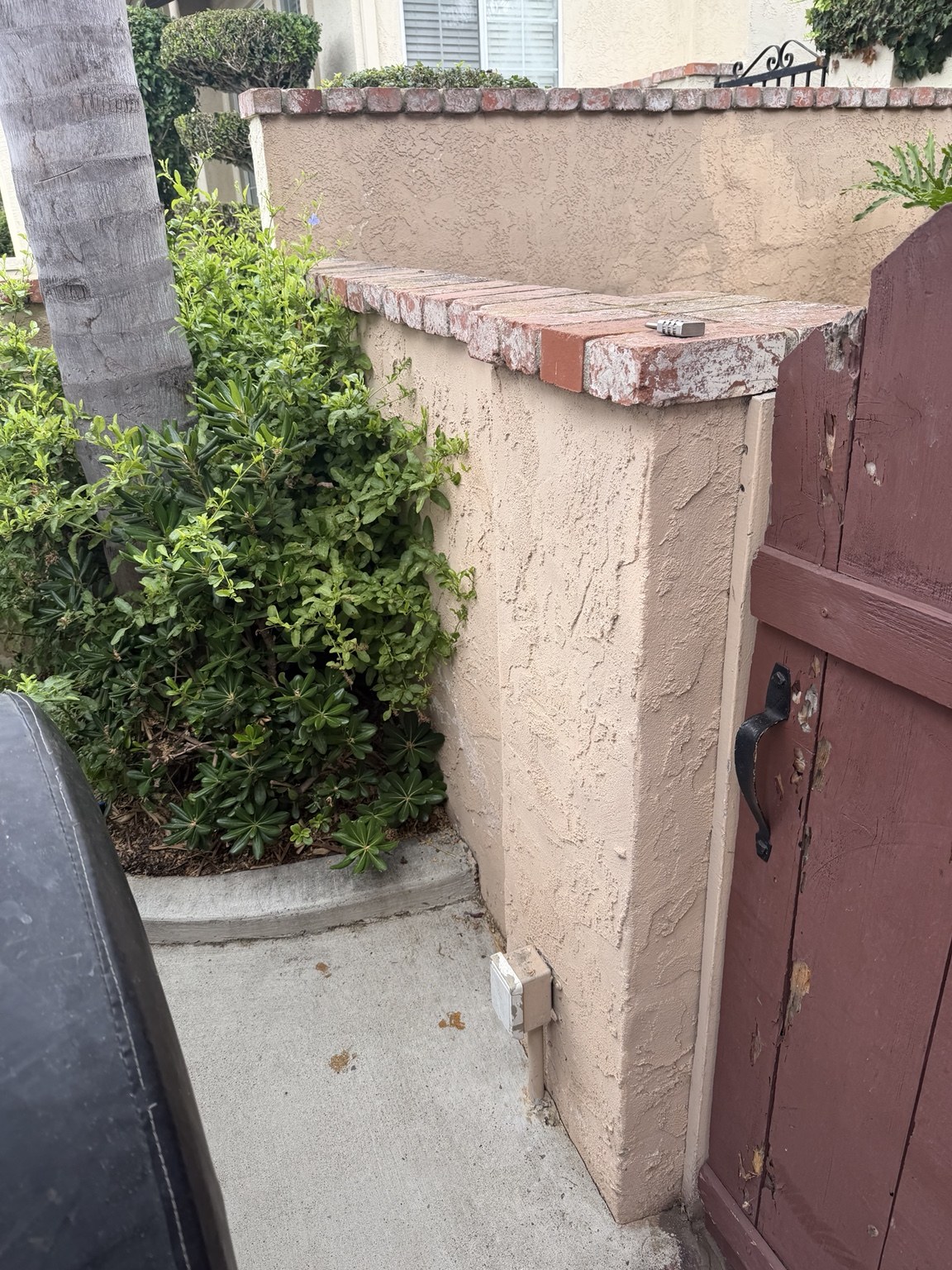 First view of gate and small wall before removal