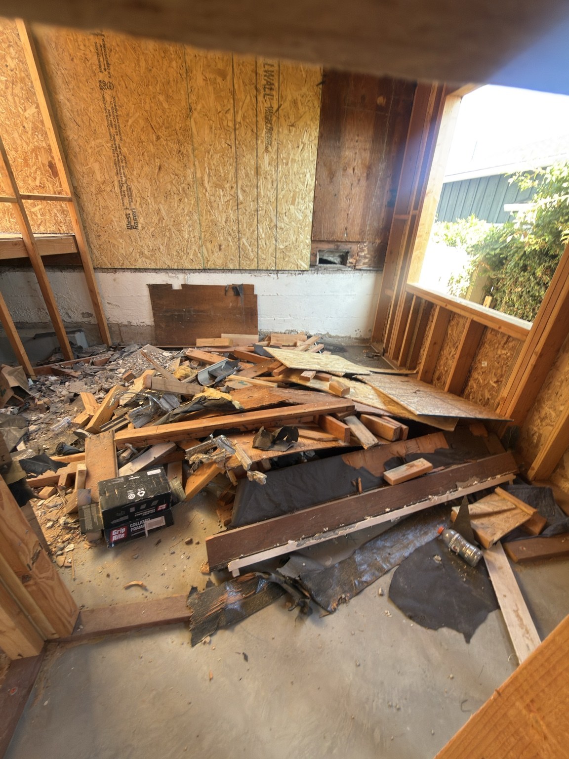 Interior demolition debris before cleanup