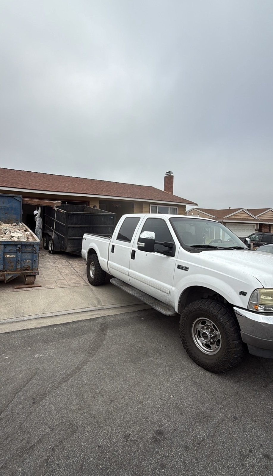 SD Pros truck and trailer hauling demolition debris
