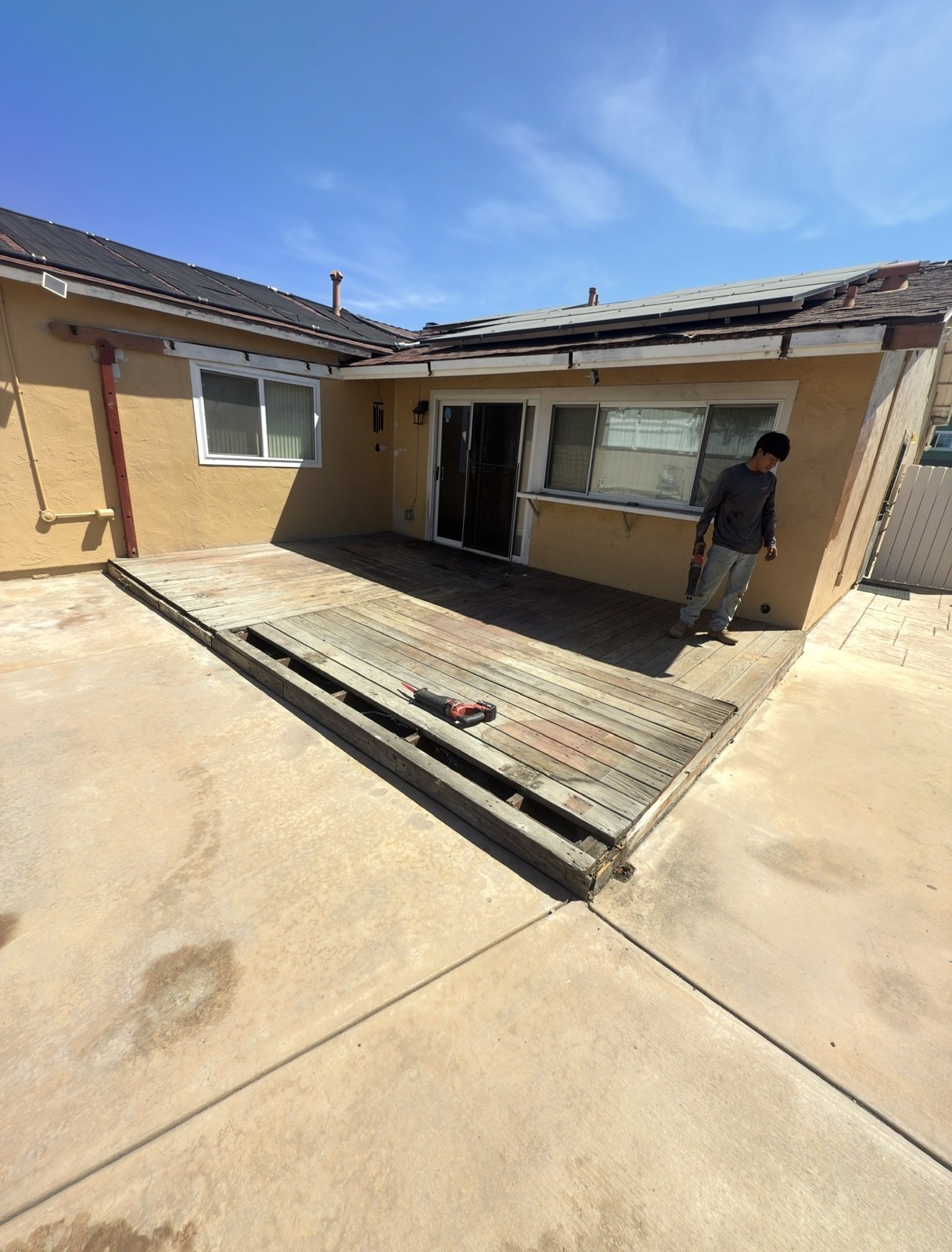 Wood patio deck before demolition