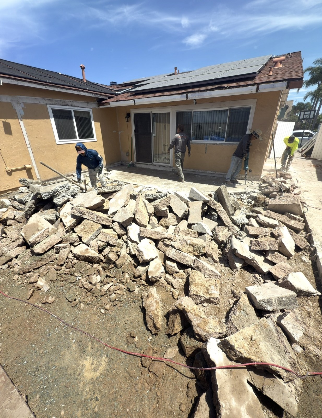 SD Pros crew removing the patio and breaking up concrete